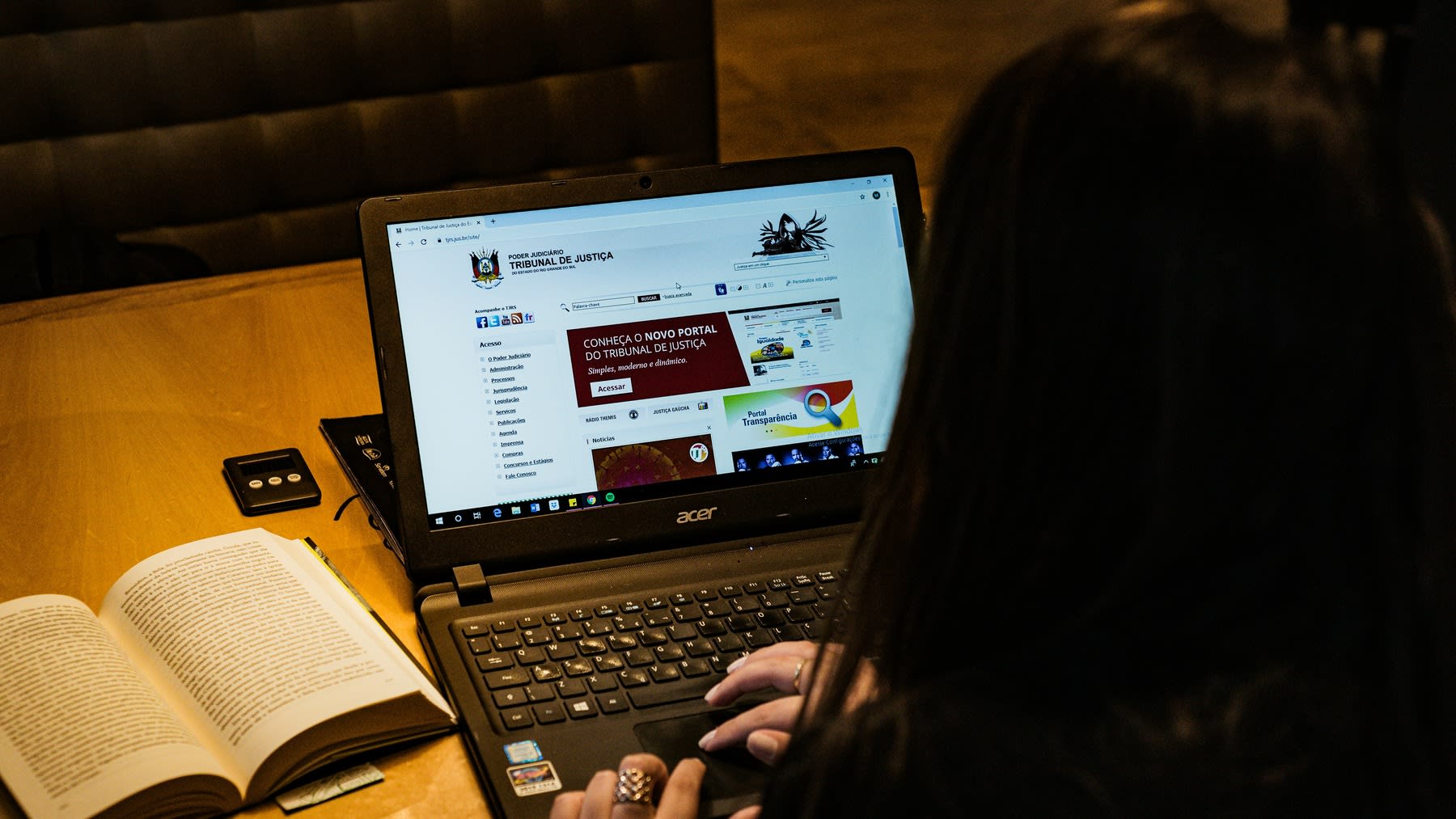 Woman using her laptop for criminal research